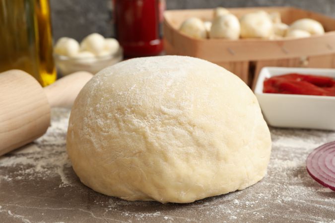Ingredients for cooking pizza on gray background