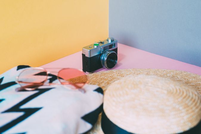 Summer trendy sunglasses, towel, hat and camera