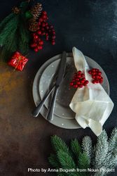 Top view of holiday table setting with grey plates 0JpPp4