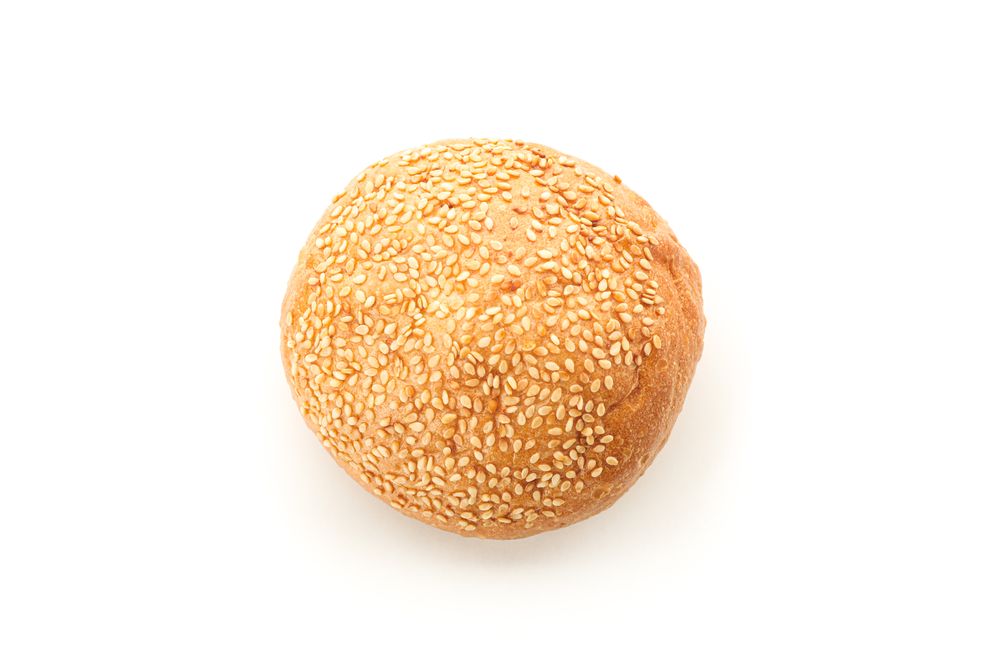 Bun isolated on plain background, top view. Bakery products