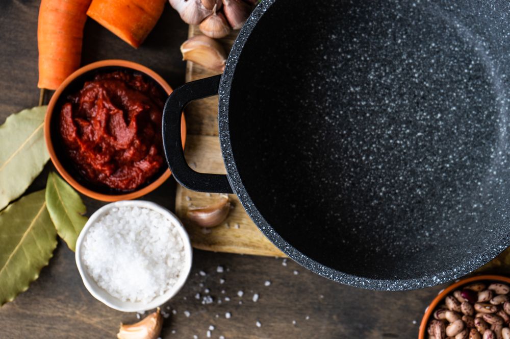 Top view of fresh ingredients for dinner surrounding pan