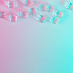 Ice cubes in vibrant bold gradient holographic colors