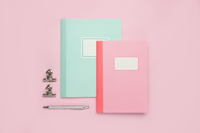 School stationery set on pink background