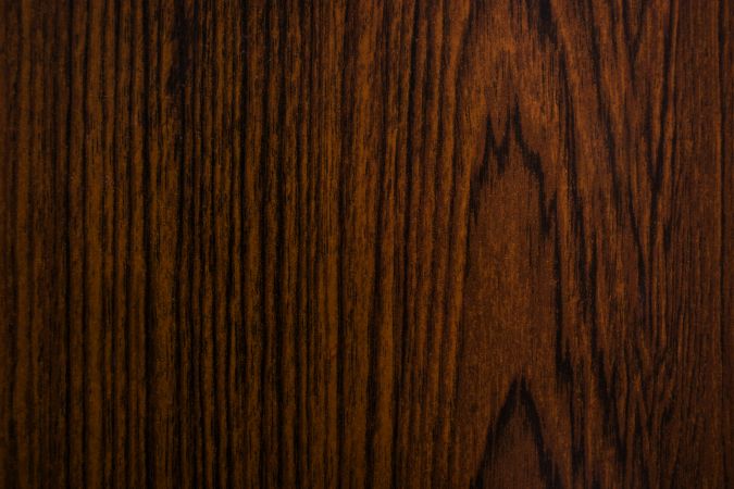 Texture background of top view of a dark flat wooden table