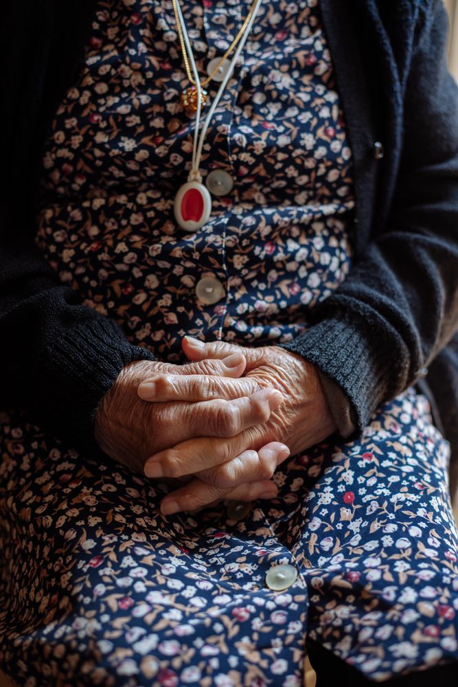 Detail of hands of an older woman