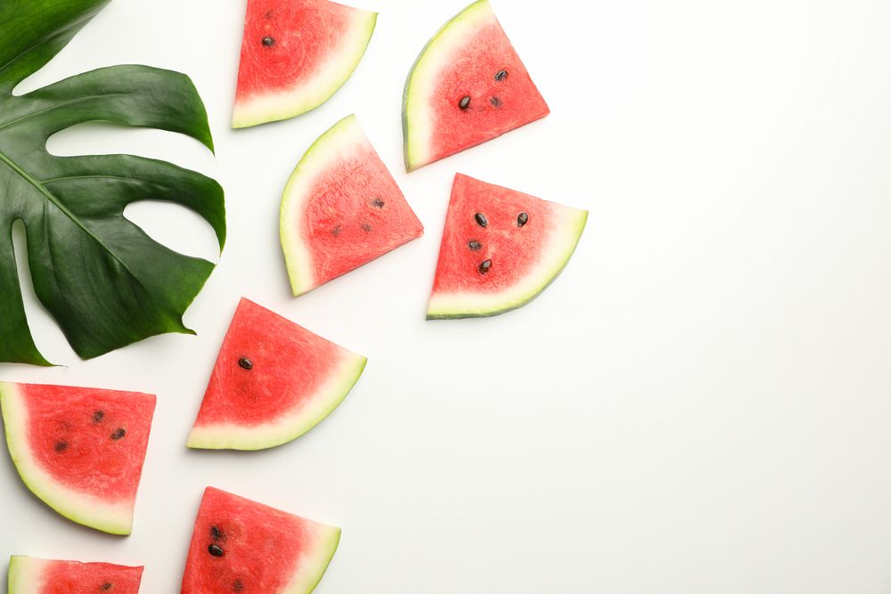 Composition with fresh watermelon slices on blank background, top view