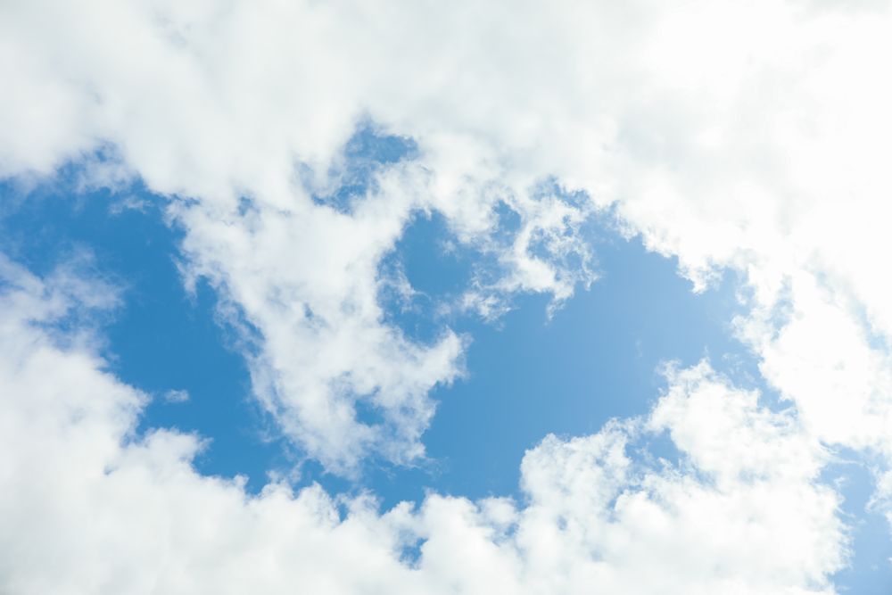 Blue sky with smoky clouds on whole background