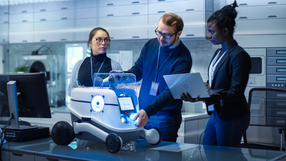 Multi Ethnic Team of Male and Female Leading Scientists Work on Innovative Robotics Technology.