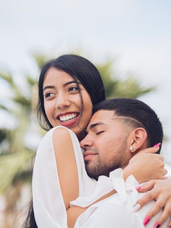 Man bonging smiling woman with love and tenderness