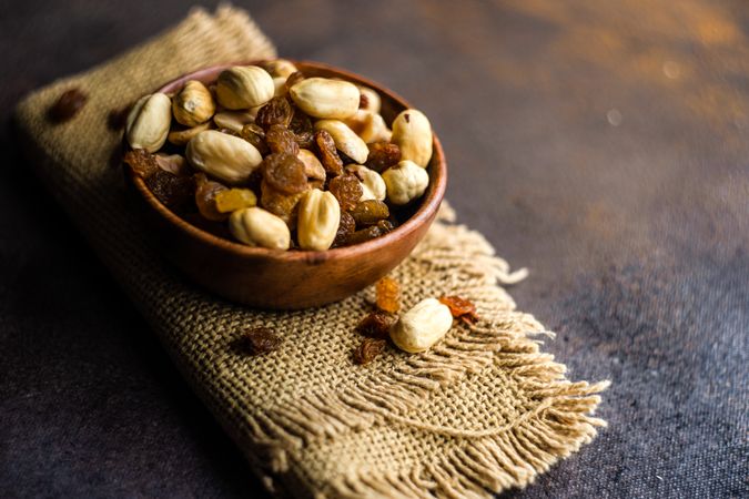 Healthy nuts on dark table