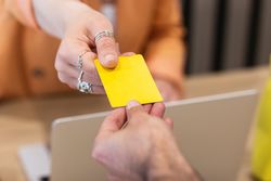 Anonymous woman making payment during online shopping