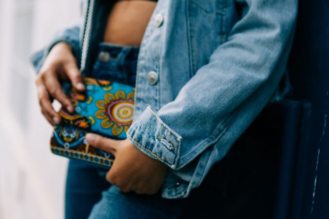 Stylish Black female with fashion bag