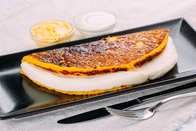 Cachapa, typical Venezuelan dish made with corn and stuffed with cheese