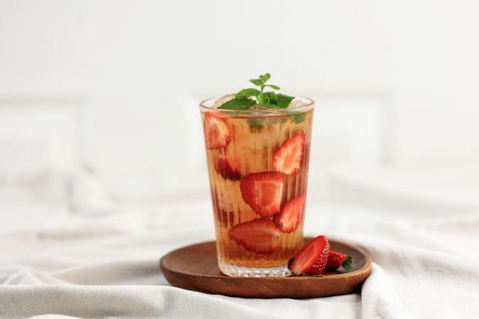Strawberry Iced Tea Decorated with Fresh Mint and Strawberrie