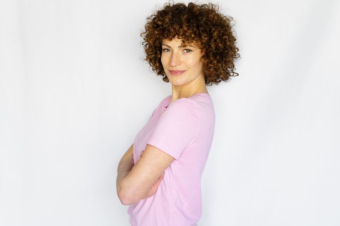Woman in pink t-shirt in studio shoot