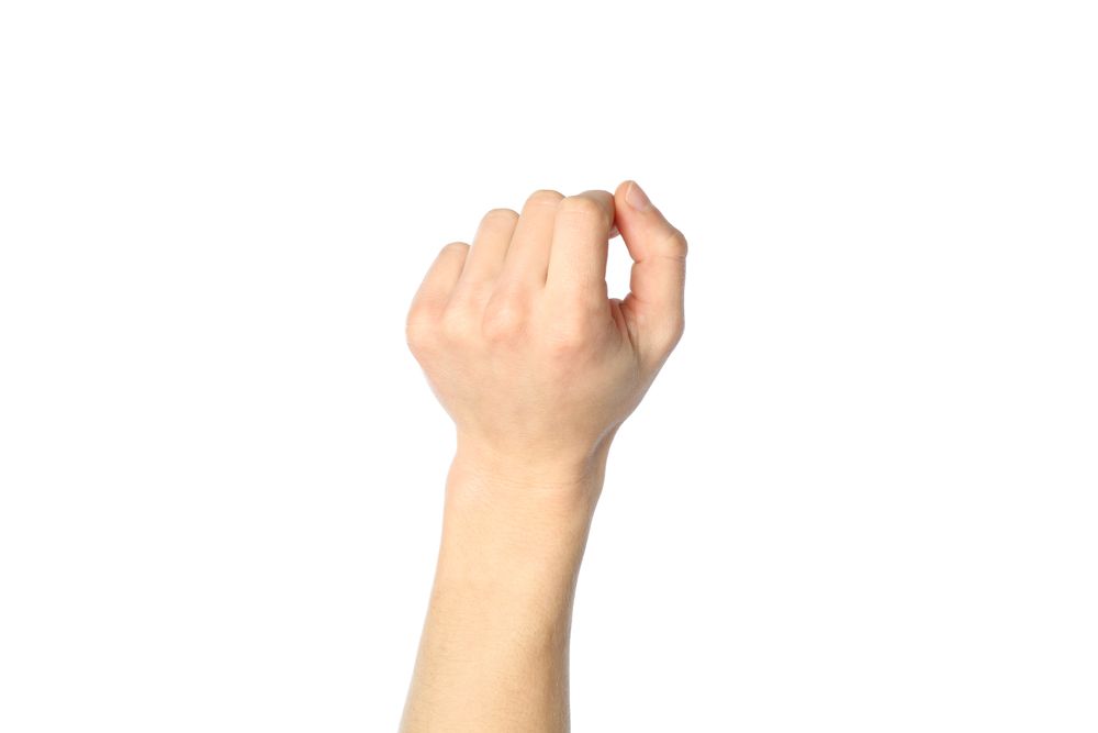 Male hand isolated on plain background. Gestures