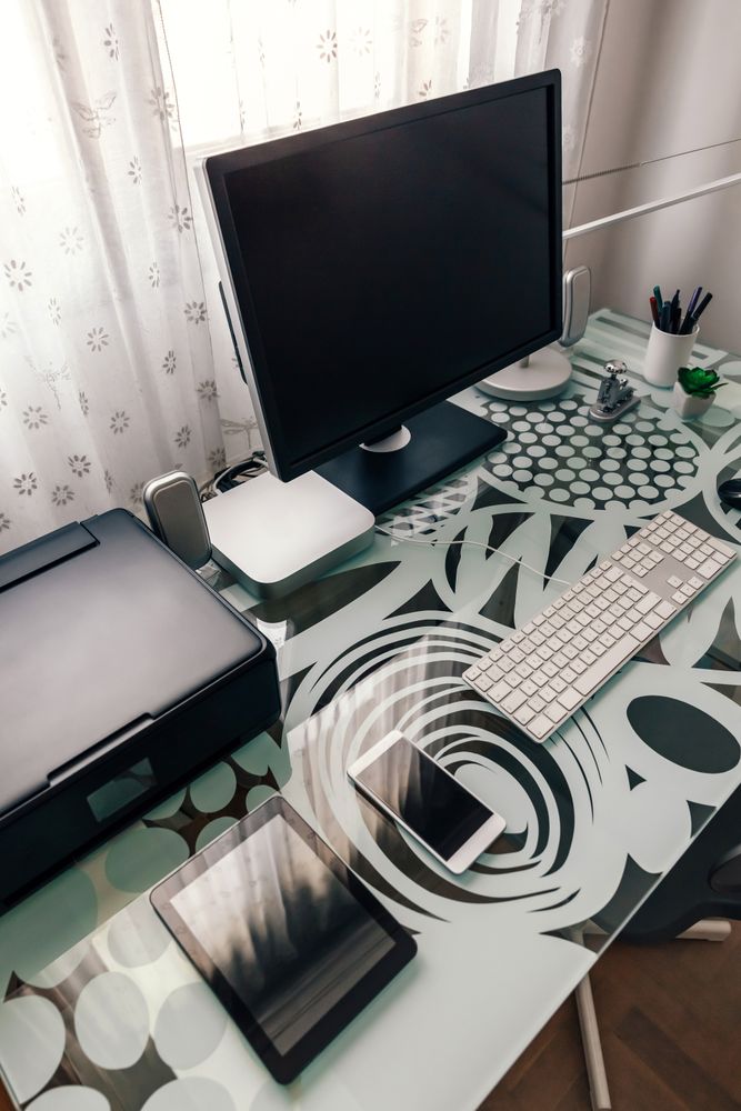 Workstation with table, computer and printer