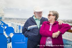 Mature Couple Enjoying The Deck of a Cruise Ship 5wXRoA