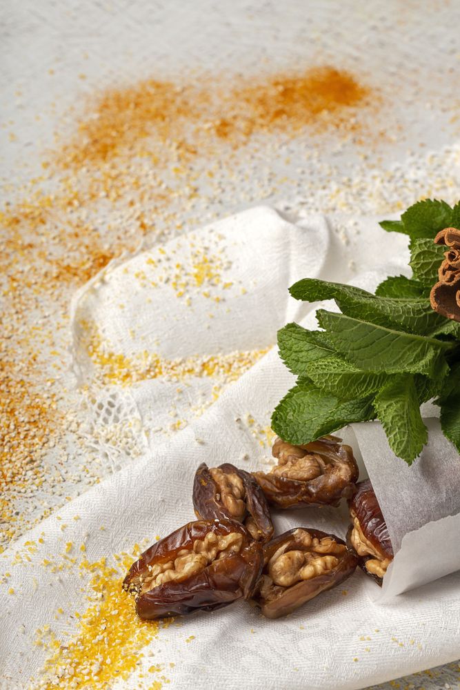 Dates fruits with walnuts, mint and cinnamon for Ramadan