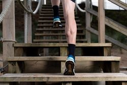 Sportsman running on stairs
