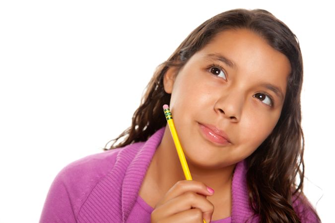 Hispanic Girl Thinking with Pencil