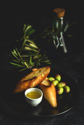 Fresh Spanish extra virgin olive oil with olives