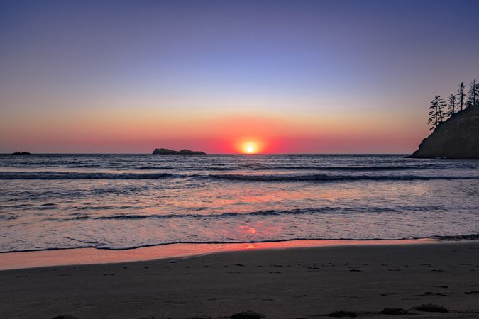 Waves coming into beach during beautiful dusk