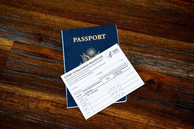 COVID-19 vaccination card and US passport