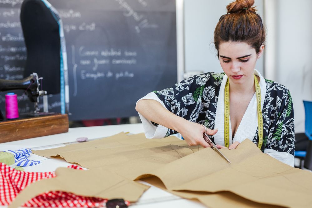 Woman in a sewing school