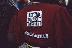 London, England, United Kingdom - March 19 2022: Back of sweater with “Defend the Right to Protest"