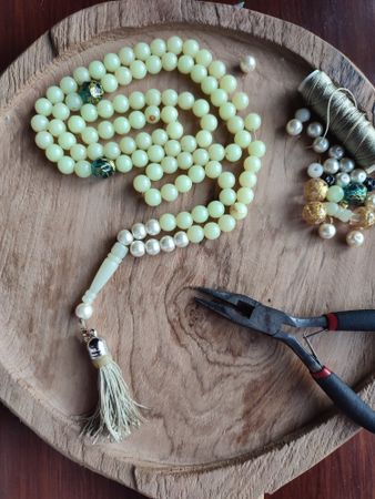 Praying beads, pliers, and strings