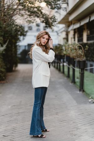 Charming woman posing on street