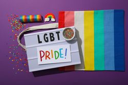 LGBT parade concept, inscription on board.