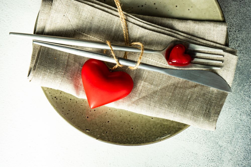 St. Valentine day card concept with napkin and silverware
