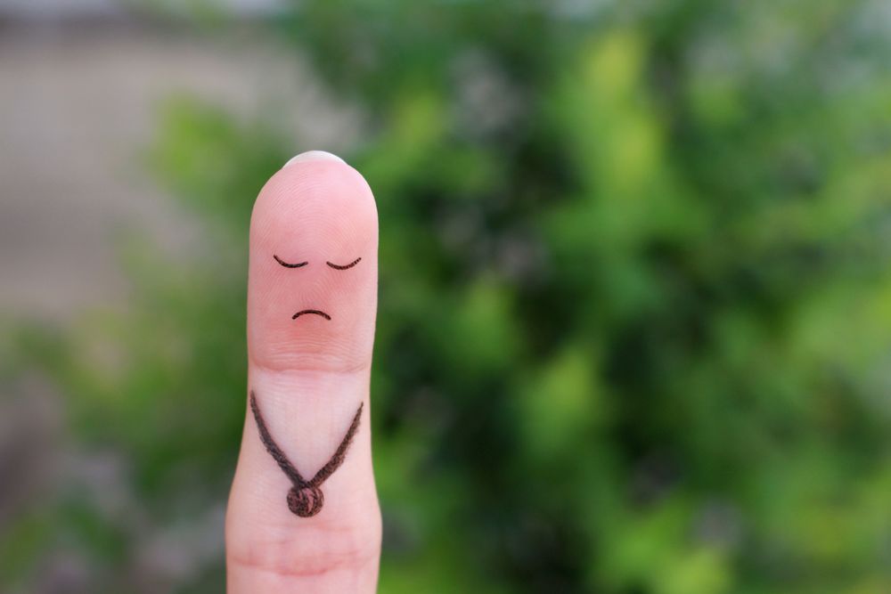 Finger art of a lonely sad man.