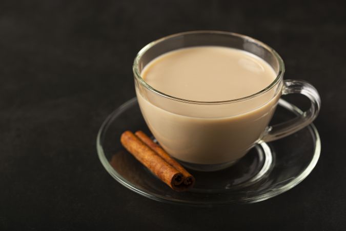 Cup of coffee with creamy milk.