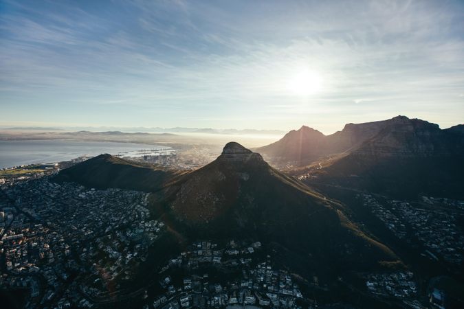 Birds eye view of city of cape town under blue sky and bright sunlight