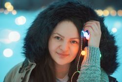 Beautiful woman portrait and string lights