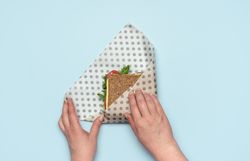 Wrapping sandwich in a beeswax cloth, top view