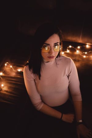 young woman and background lights