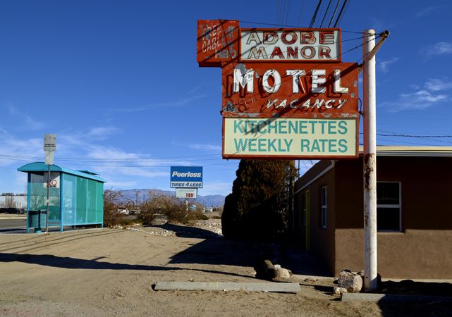 Sign for the old Adobe Manor Motel on historic U.S. Route 66