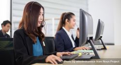 Banner of business call center with women and man in headsets sitting in office desk using computer 4mqJo4
