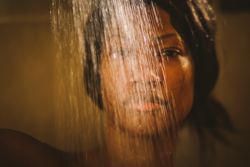 Black woman taking shower