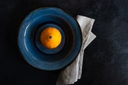 Top view of single squash in elegant decorative autumnal table setting