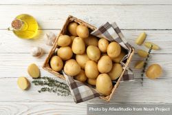 Looking down at box of potatoes on rustic background 41gDg0
