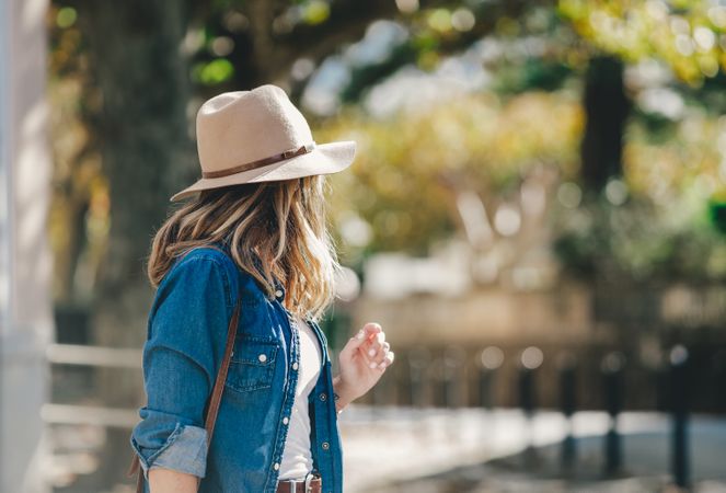 Tourist woman walking on the street