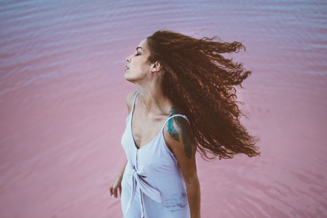 Woman enjoying sea breeze