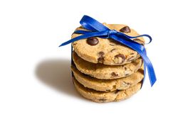 Closeup of chocolate chip cookies pile isolated on blank background