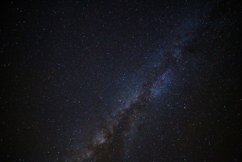 milky way galaxy and space dust in the universe, Long exposure photograph, with grain.
