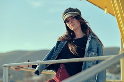 female standing on balcony on nature